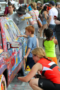 Kids painting an "art car" at FIGMENT Boston (June 5, 2010) (Image (c) 2010 Lucid Revolution)