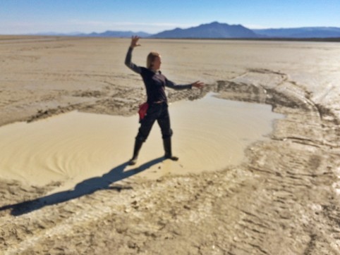 Phoenix stood in a puddle near the entrance to the playa; Shalaco was taking her pic for documentation purposes