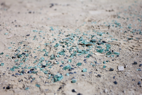 Individual pieces of safety glass from a broken car window will be picked up by hand to prevent unnecessary removal of playa. Photo by Phoenix Firestarter.