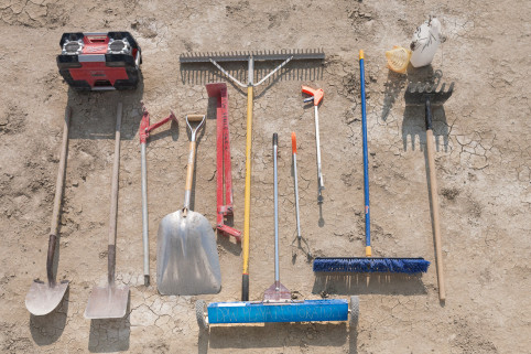 Every morning the vehicles are loaded up for the tools necessary for a day’s work. Landscape rakes, magnet rakes, round and square nose shovels, T-stake and cement stake pullers, brooms, 5-gallon buckets, and 50 gallon bins.