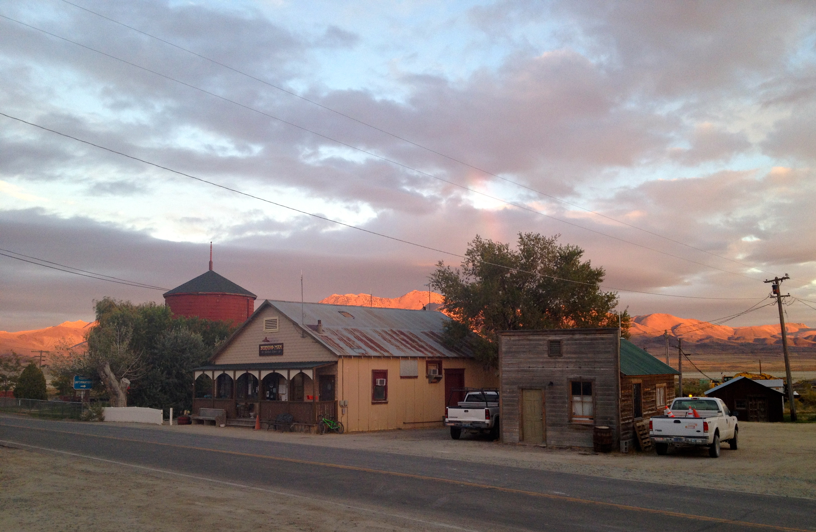 Sun sets across from Burning Man's main office in this old cowboy town, with the auxiliary office to the right that's actually an old jailhouse. Come in to get a charged battery for your crew radio; stay for the fantasies about what kind of folks had been in there before we were even alive.
