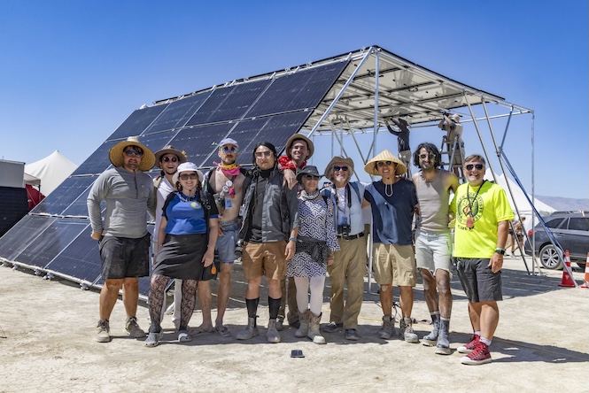 Volunteers from BLAST document Camp Bao Chika Wow Wow’s solar powered electric mutant vehicle charger, 2024 (Photo by Jim Eagan)
