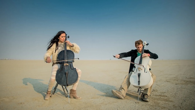 Jeremy and Ceren play cello on the open playa (Photo by Juan P. Zapata)