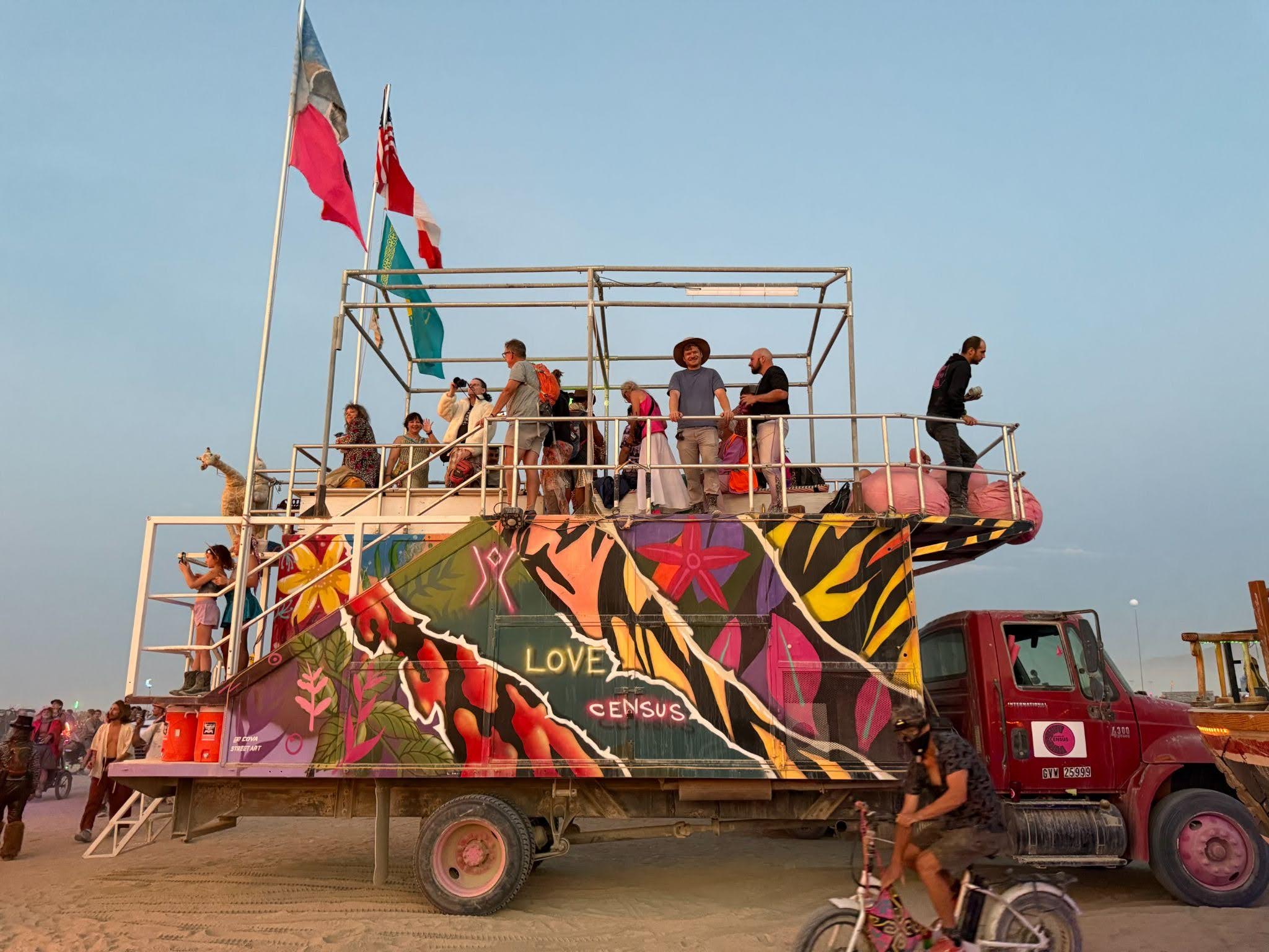 Census team members riding on their mutant vehicle, The Data Beast